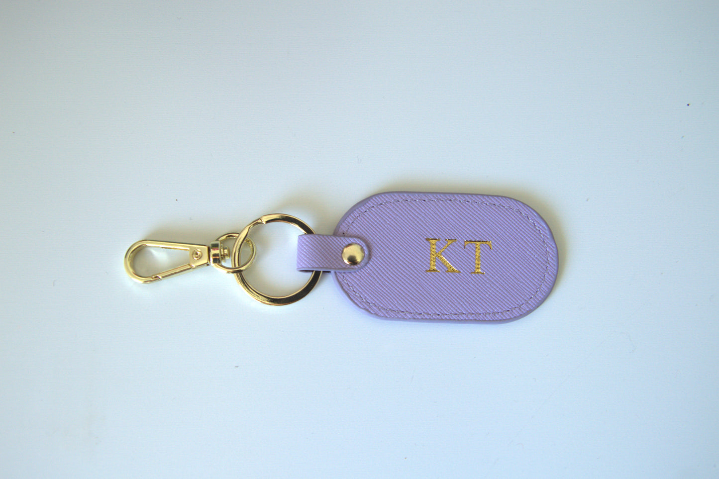 MONOGRAMMED OVAL LILAC LEATHER KEYRING