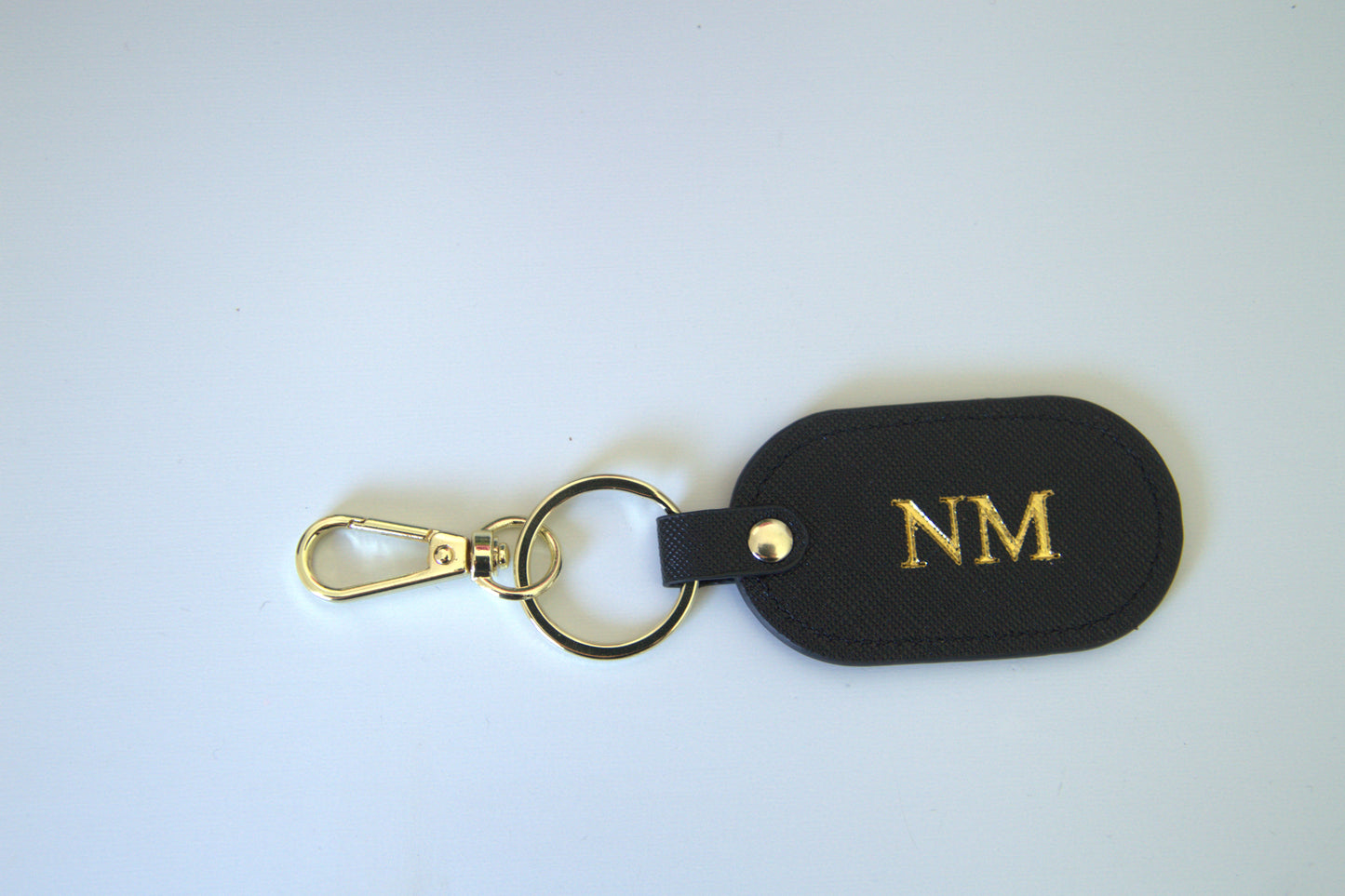 MONOGRAMMED OVAL BLACK LEATHER KEYRING