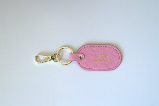 MONOGRAMMED OVAL BABY PINK LEATHER KEYRING