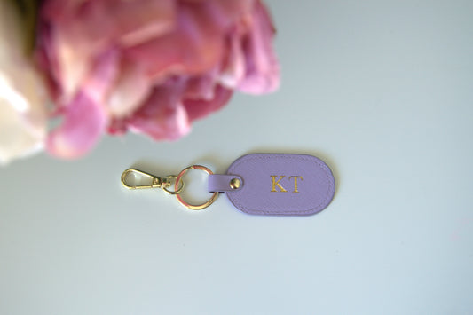 MONOGRAMMED OVAL LILAC LEATHER KEYRING