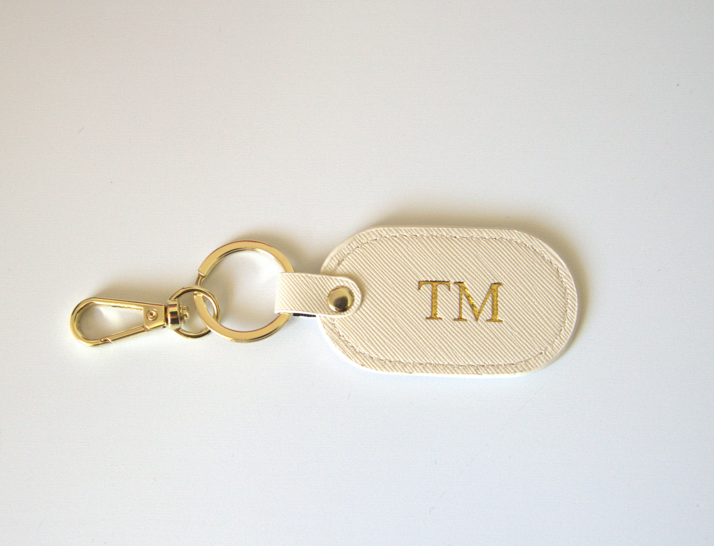 MONOGRAMMED OVAL IVORY LEATHER KEYRING