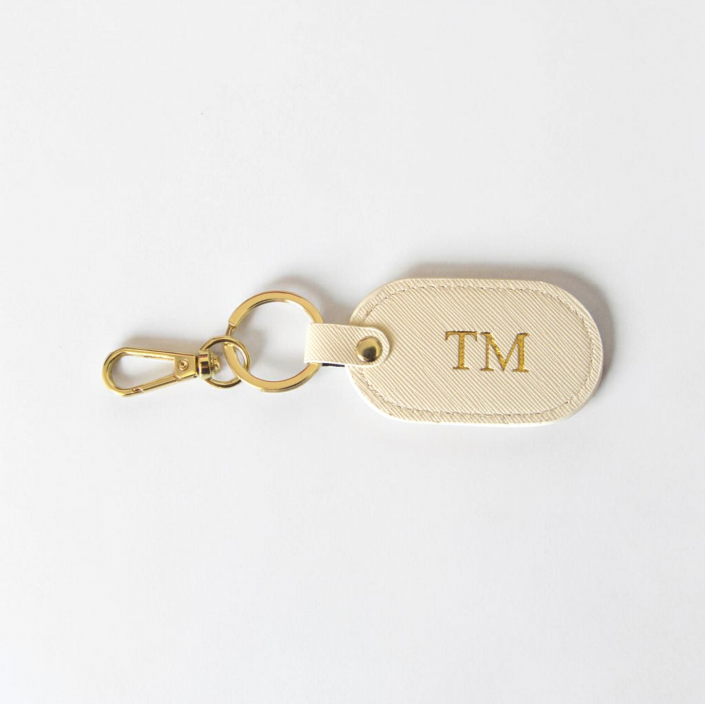 MONOGRAMMED OVAL IVORY LEATHER KEYRING